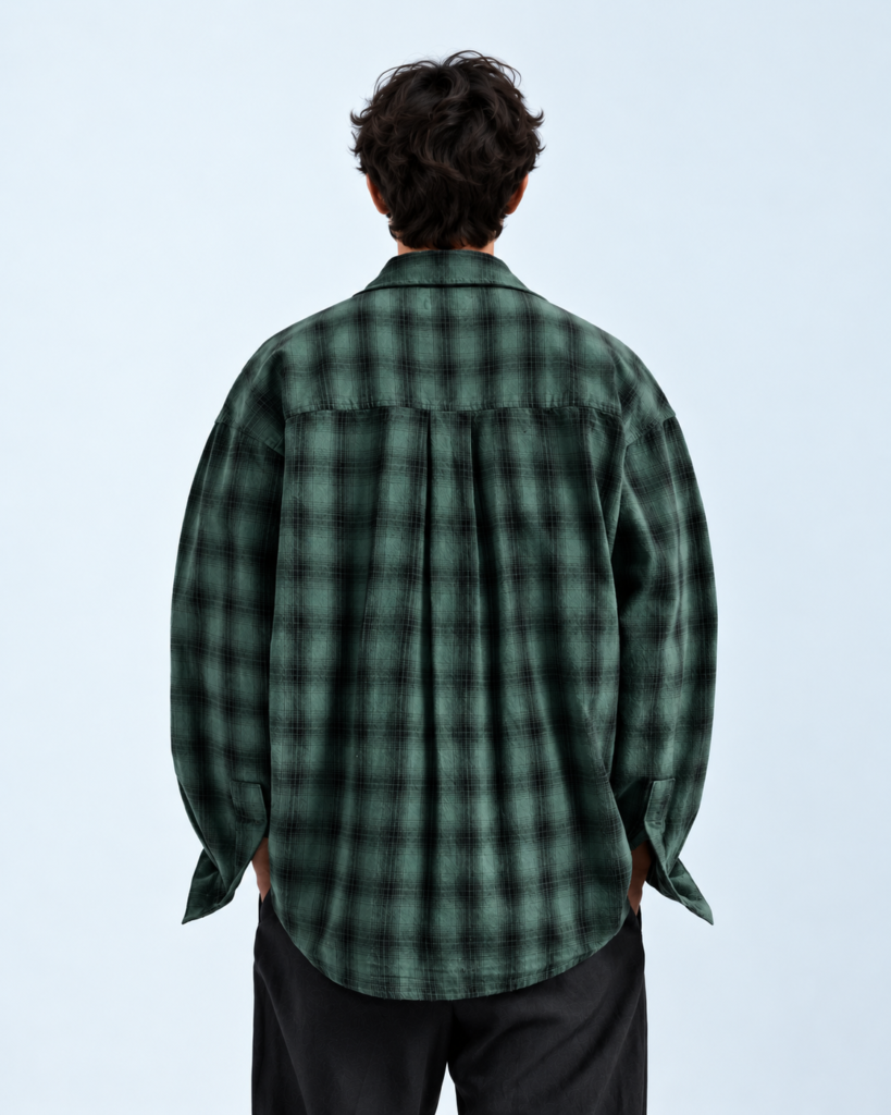 back view in green plaid flannel