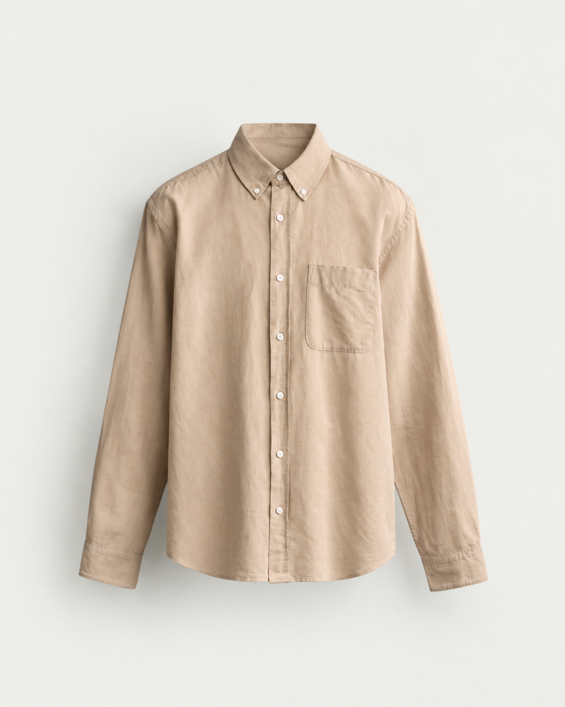 beige button down shirt on cream background