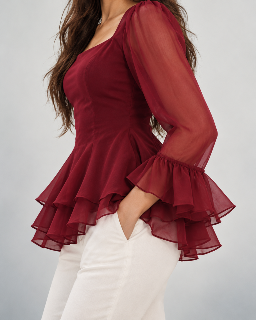 burgundy ruffled blouse editorial portrait