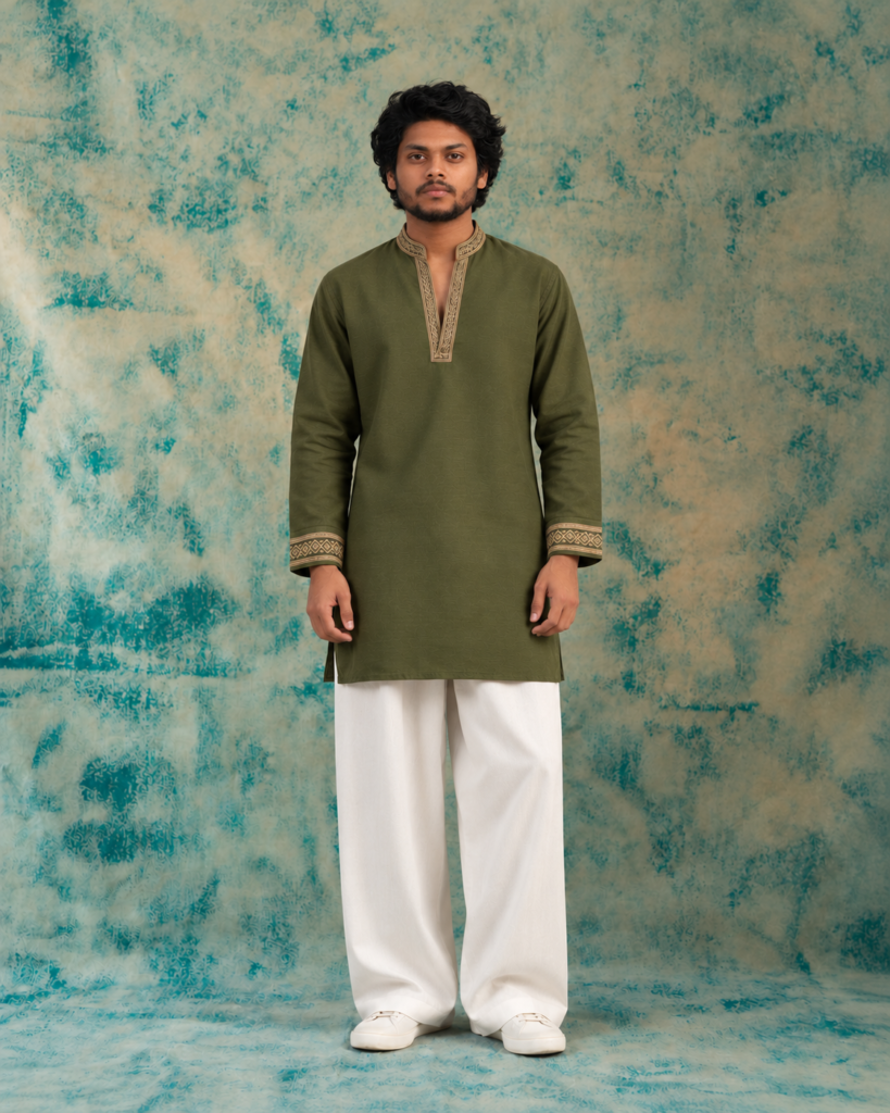olive kurta against teal backdrop